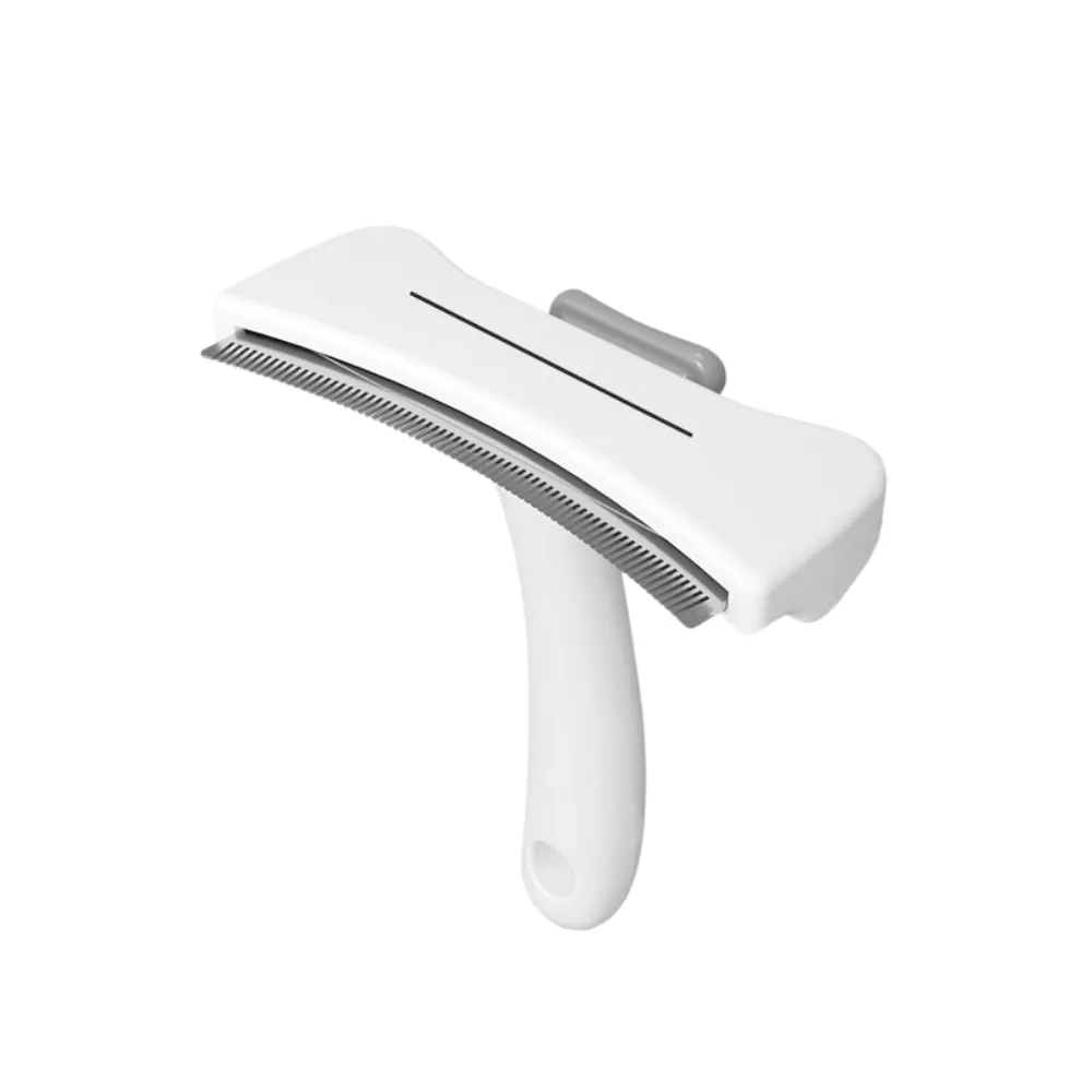 White One-Click Pet Hair Remover Brush White one-click pet hair remover brush with curved comb teeth and ergonomic handle for cat and dog grooming.