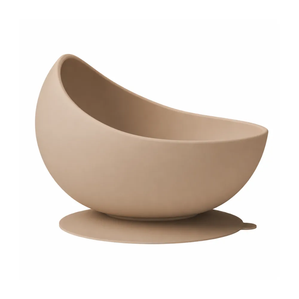 Brown Silicone Slow Feeder Dog Bowl Brown silicone slow feeder dog bowl with wide suction base on a clean white background